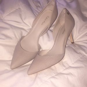 Calvin Klein pointed pumps. nude snakeskin